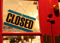 Closed sign on door of restaurant