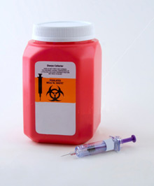 Sharps container and needle
