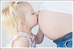 photo: pregnant woman and girl