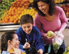 Mon shopping for fruits and vegetables with son and daughter