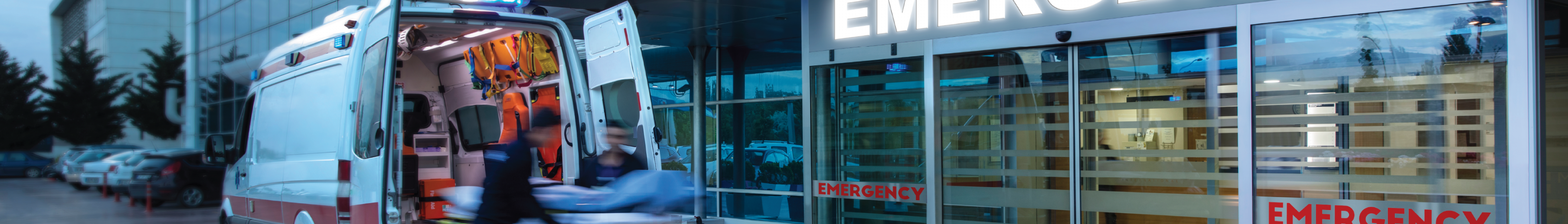 Ambulance in front of an emergency room entrance