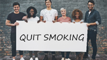 QuitSmokingGroupHoldingSign