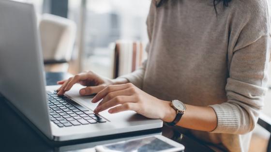 Lady typing on laptop