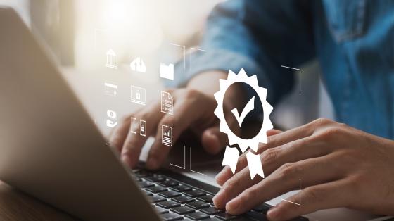 person working on laptop with floating icons