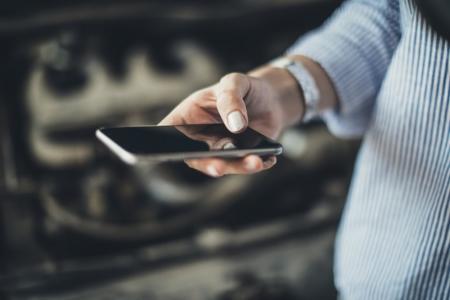 Hand holding smartphone