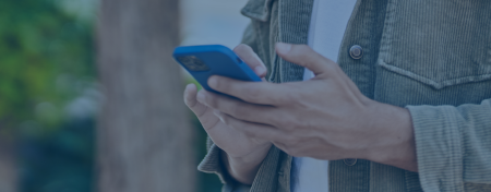 hands holding cell phone